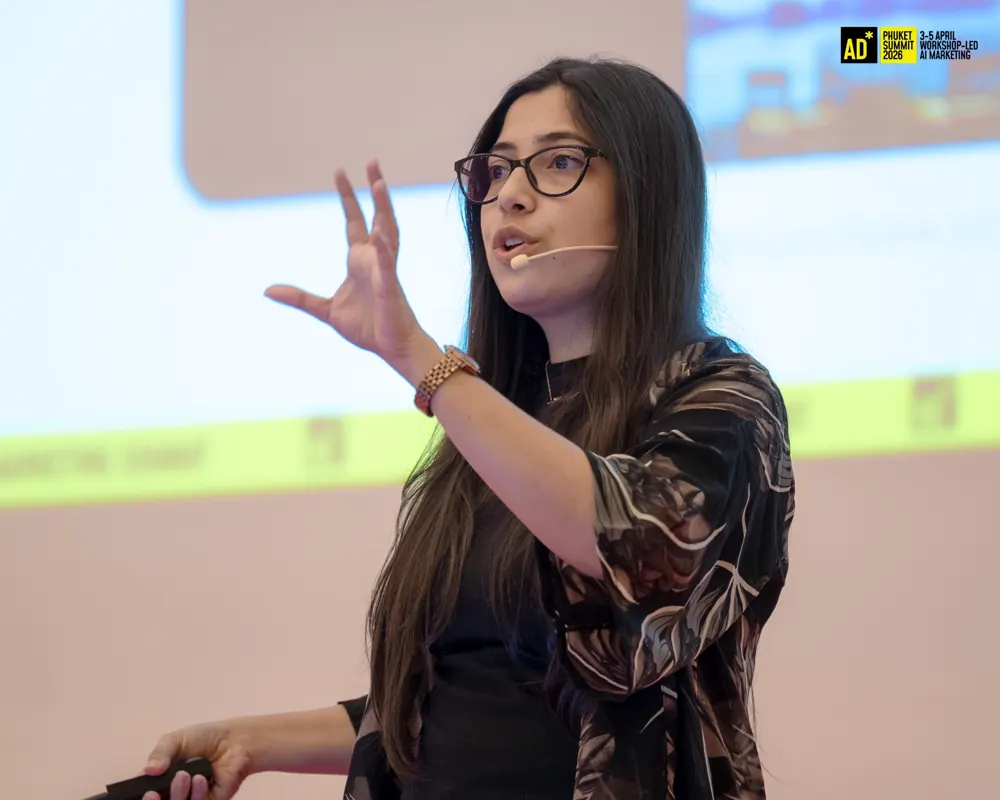 Speaker on stage at an AdSummits AI event